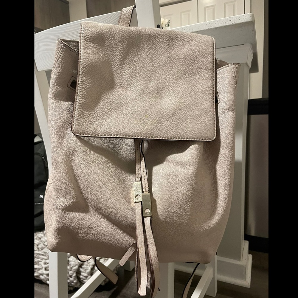 Lightly used Kate Spade bone leather flap backpack
